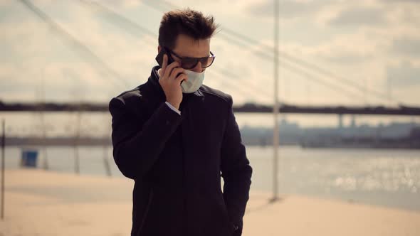 Businessman Walking In Face Mask On Coronavirus Lockdown.Coronavirus Lockdown Self Distance Pandemic alt