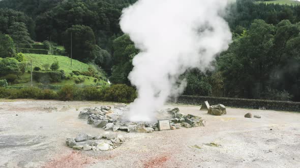 Drone Footage of the Geyser with Dense Steam alt