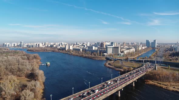 Dnieper Bay Near Rusanovka Island Aerial Panoramic View City Traffic on the Patona Bridge