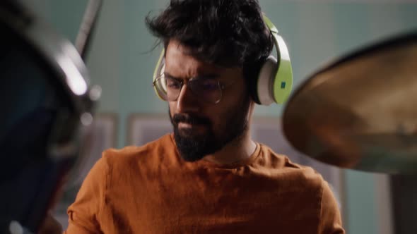 Indian Drummer Rehearsing at Home alt