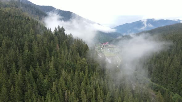 Fog in the Mountains. Aerial View of the Carpathian Mountains in Autumn. Ukraine alt
