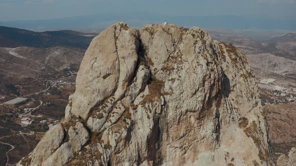 Aerial View of Rock Formation and Little City on the Foot alt