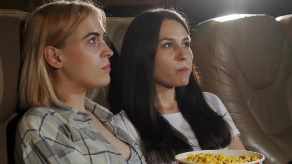 Beautiful Women Showing Thumbs Up While Watching Movie at the Cinema 1080p alt