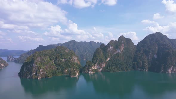 Aerial view landscape view Mountain in lake Refection sky with cloud on lake water. alt