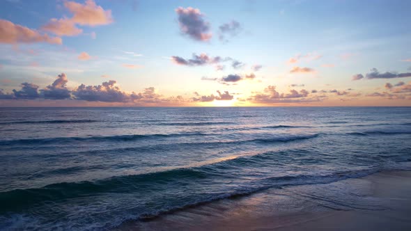 Aerial view Beautiful view sunset or sunrise over sea surface beautiful wave Amazing light twilight alt