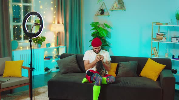 Good Looking Man Influencer Playing with His Cute alt