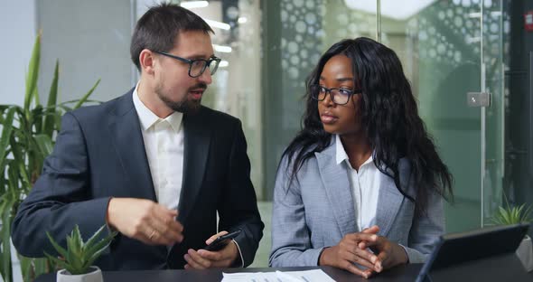 Experienced Mixed Race Businesspeople Rejoicing the Ending of Webinar and Clapping Hands alt