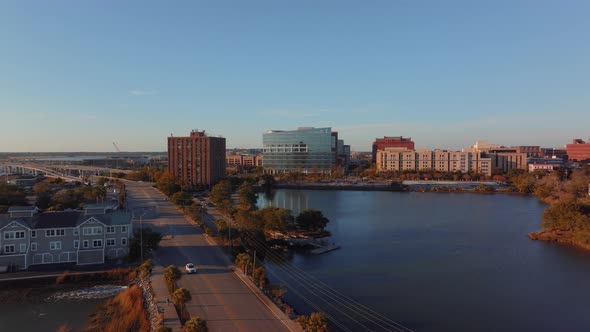 A car travels along Lockwood Drive in downtown Charleston alt
