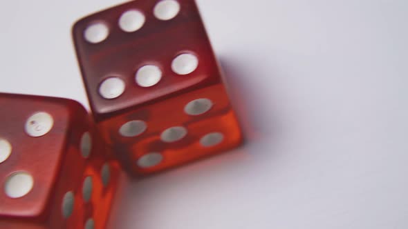 Motion Over Dices with Spots on Sides on Light Background alt