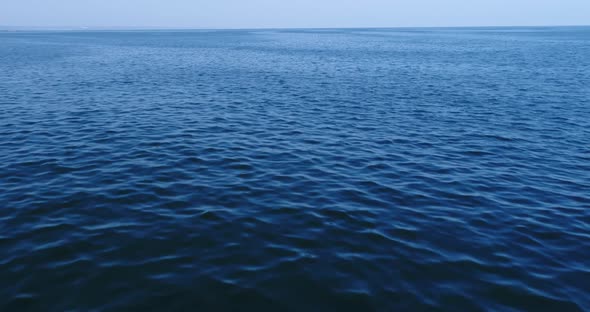 4k drone video flight over ocean, sea. Close to the water alt