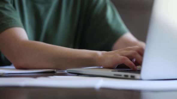 Closeup view as woman working with notebook at home as freelancer alt