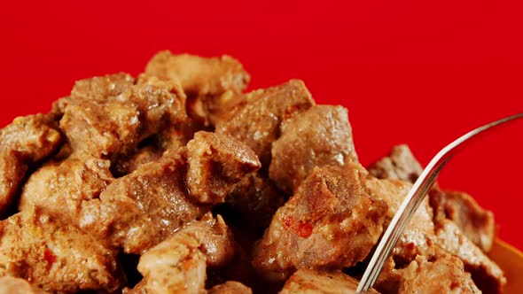 Succulent Pieces of Meat in Yellow Plate alt