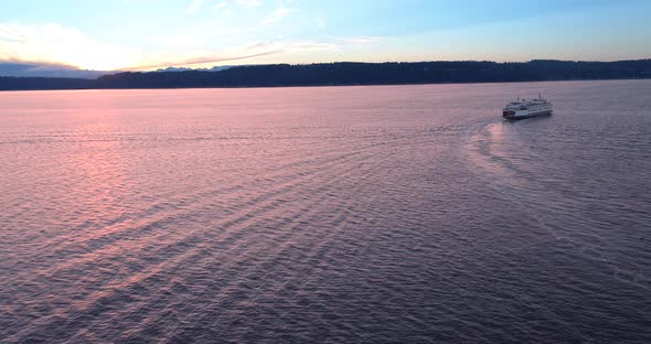 Washington State Ferry To Clinton Illuminated Under Bright Sunset alt
