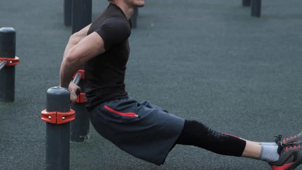 Man training outdoors on sports field