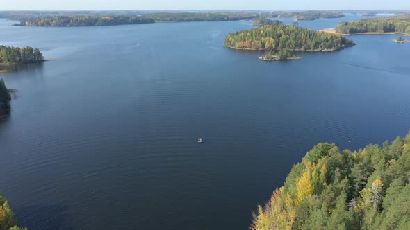 The Large Lake Saimaa in Finland with the Speedboat alt