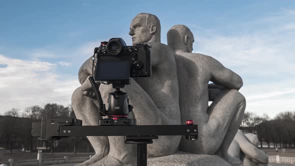 Digital Camera Moving On Right By Camera Slider Shooting Art Sculpture Of Gustav Vigeland At Frogner alt