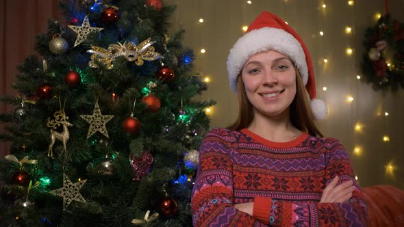 Portrait Of Young Woman with Santa Hat