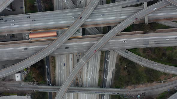 AERIAL: Slow Overhead Flighty Shot of Judge Pregerson Highway Showing Multiple Roads, Bridges alt