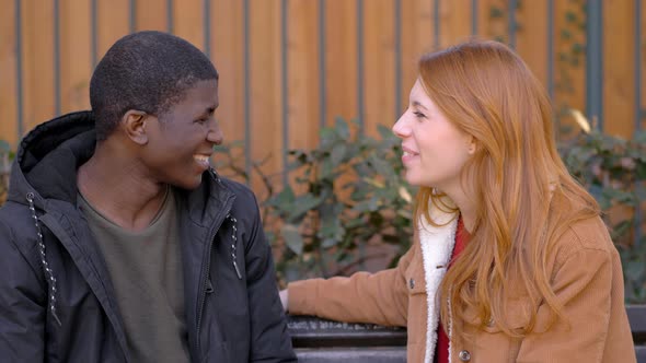Red haired woman Refusing African American Man Trying To kiss Her.Friend Zone alt