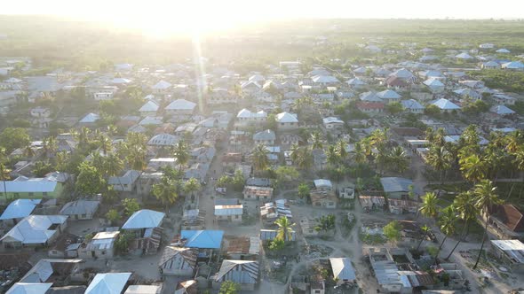 Aerial View of Houses Near the Coast in Zanzibar Tanzania Slow Motion alt