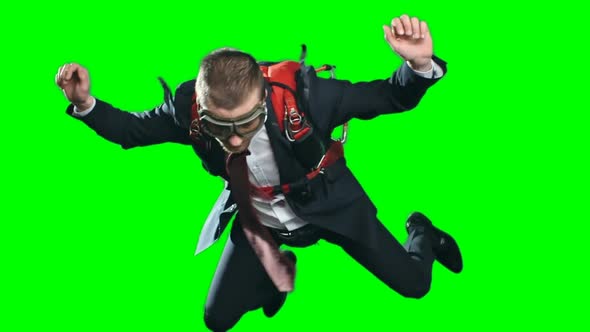 Assured Businessman Parachuting alt