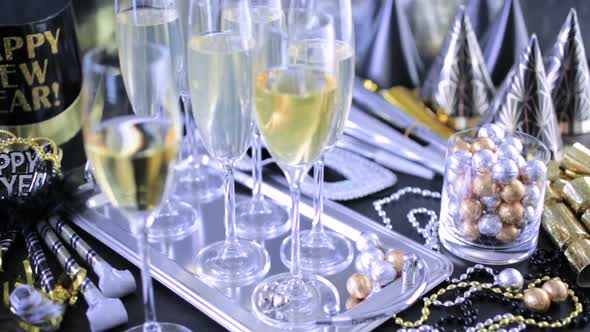 New Year Eve party with champagne and chocolates. alt