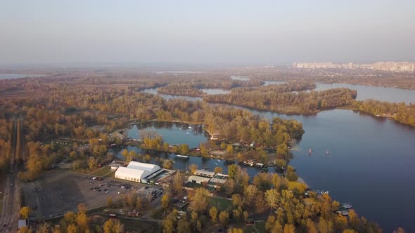 Aerial: Recreation park in Obolon district in Kiyv, autumn time alt