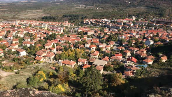 Tilting over settlement in  Western Bulgaria 4K 2160p 30fps UltraHD footage - Town of Belogradchik b alt