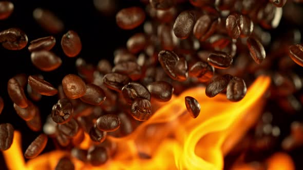 Super Slow Motion Shot of Coffee Beans and Flames After Being Exploded at 1000Fps alt