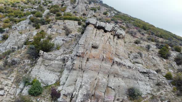 Aerial Footage Above a Foggy Mountain During Fall Season alt