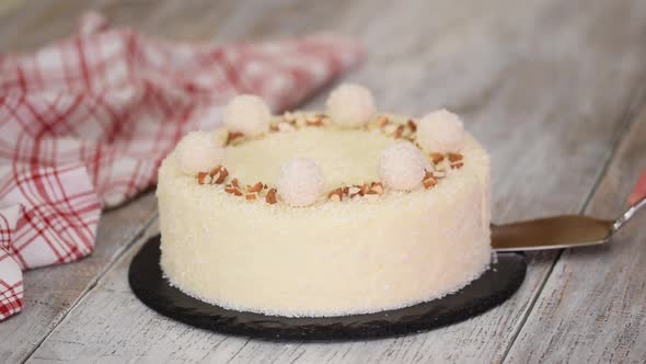 Delicious Coconut Mousse Cake Decorated with Candy and Almond