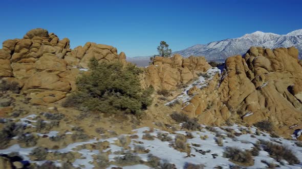 Flying Over Rock Formations alt