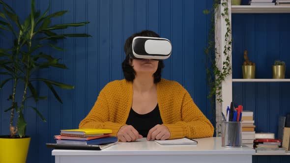 Middle Aged Woman Wearing Vr Goggle 3d Visualization and Exploring in Metaverse Futuristic Lifestyle alt