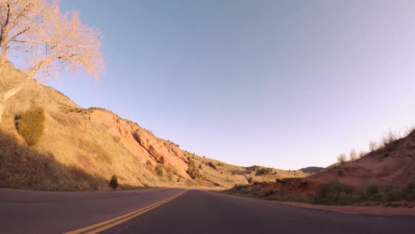 POV point of view - Drive to Red Rocks Amphitheatre at sunrise. alt