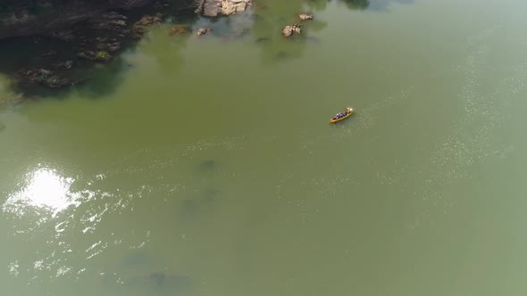 Arcing a Canoe On A Jungle River alt