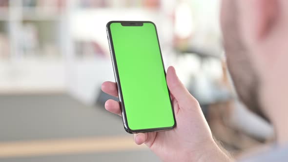 Man Using Smartphone with Chroma Key Screen alt