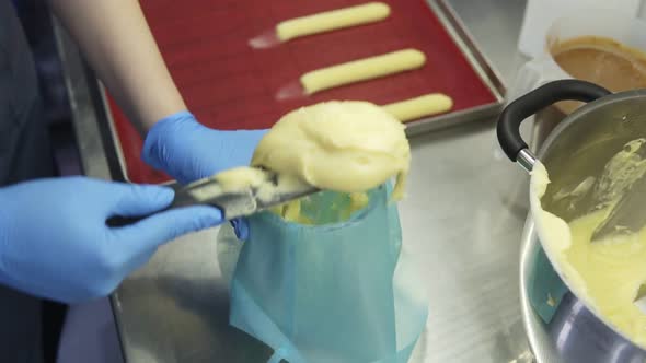 Putting Brewed Dough Into a Confectioners Tube alt