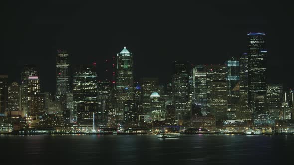 Seattle Ferry Time Lapse Leaving City Downtown Waterfront Illumination Bright Lighting At Night alt