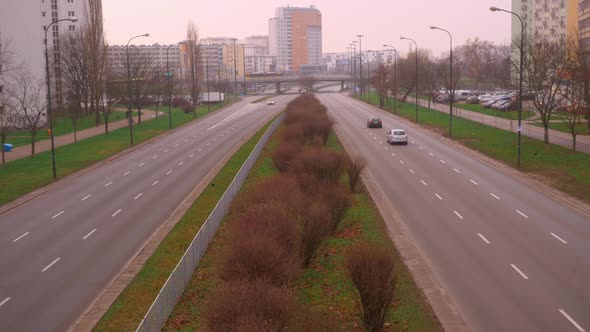 Morning Traffic on the Road in a Sleeping District in the City of Warsaw alt
