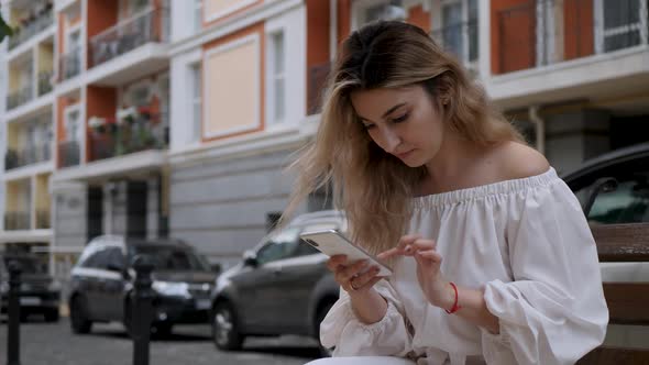 Girl Use White Smartphone Outdoor
