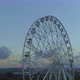 Aerial view of the Ferris wheel on the beach at sunset - VideoHive Item for Sale