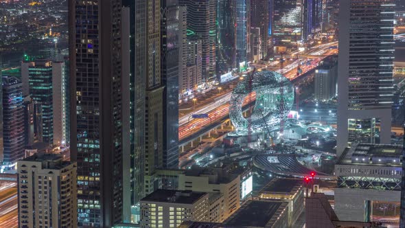 Skyline of the Buildings of Sheikh Zayed Road and DIFC Aerial Night Timelapse in Dubai UAE alt