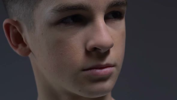 Guilty Teenage Male Scolded by Parents Looking Down, Psychological Trauma alt