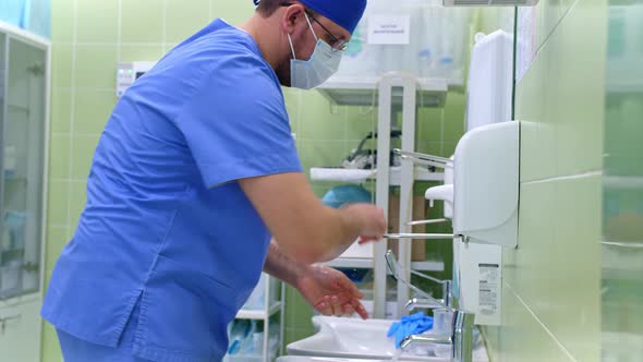 Surgeon Handles Hands Before Surgery
