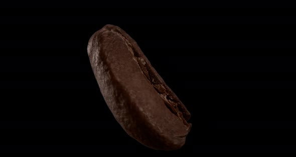 Closeup Macro Photography of a Roasted Coffee Bean Spinning 180 Degrees Shot Against a Dark alt