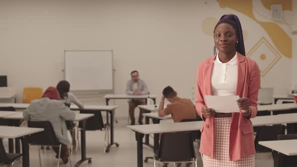 Female African Student Posing in Classroom alt