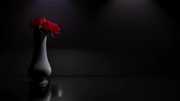 Rose Petals Falling From Vase
