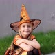 Cute Little Caucasian Girl with Blonde Hair Seven Years Old in Costume of Witch with Hat and Black - VideoHive Item for Sale