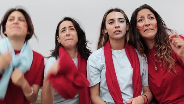 Group of Women Having Fun at Stadium While Celebrating the Victory of Their Team alt