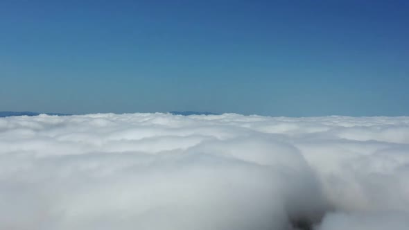 Sun above clouds Timelapse. Tropical scenery. Sunlight at blue sky alt